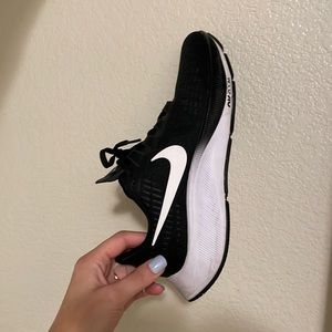 W. Nike Pegasus 37 size 8. Black laces and top. White sides with white shoosh.